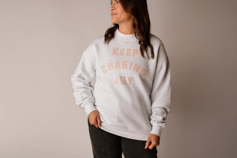 KEEP CHASING JOY CREWNECK IN ATHLETIC HEATHER GREY
