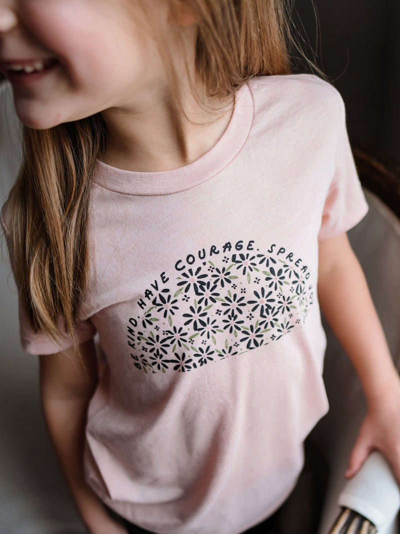 BE KIND. HAVE COURAGE. SPREAD JOY. KIDS TEE IN PEACH